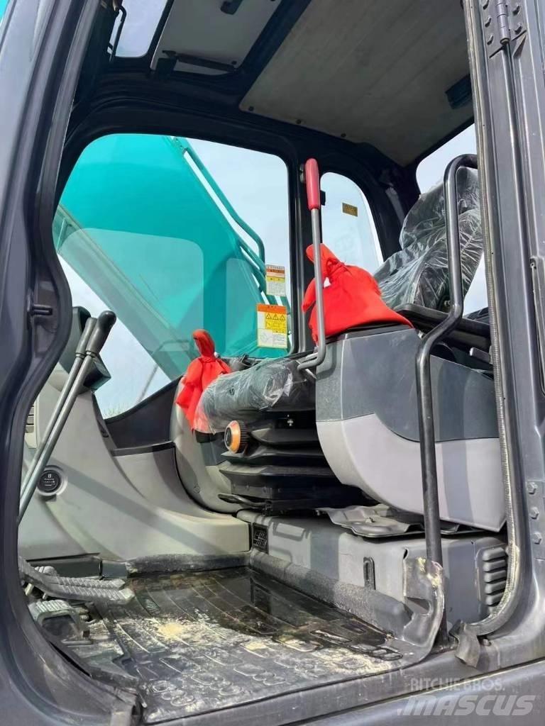 Kobelco SK210 Pelle sur chenilles