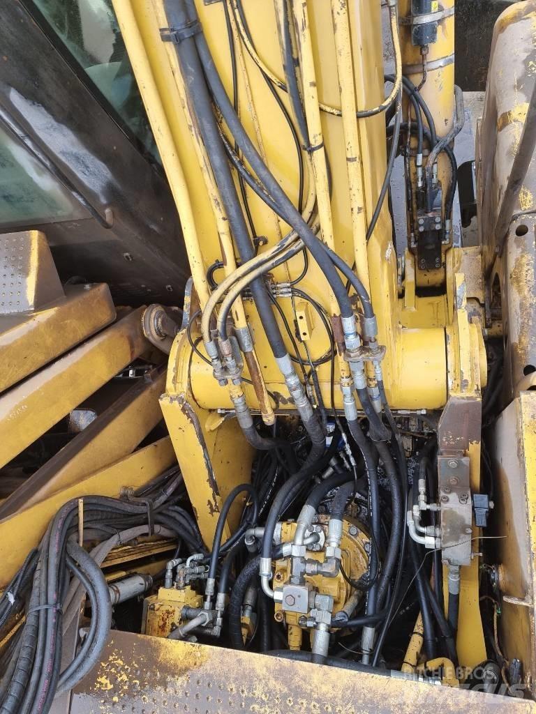 CAT M 325 D L MH Pelle à déchets