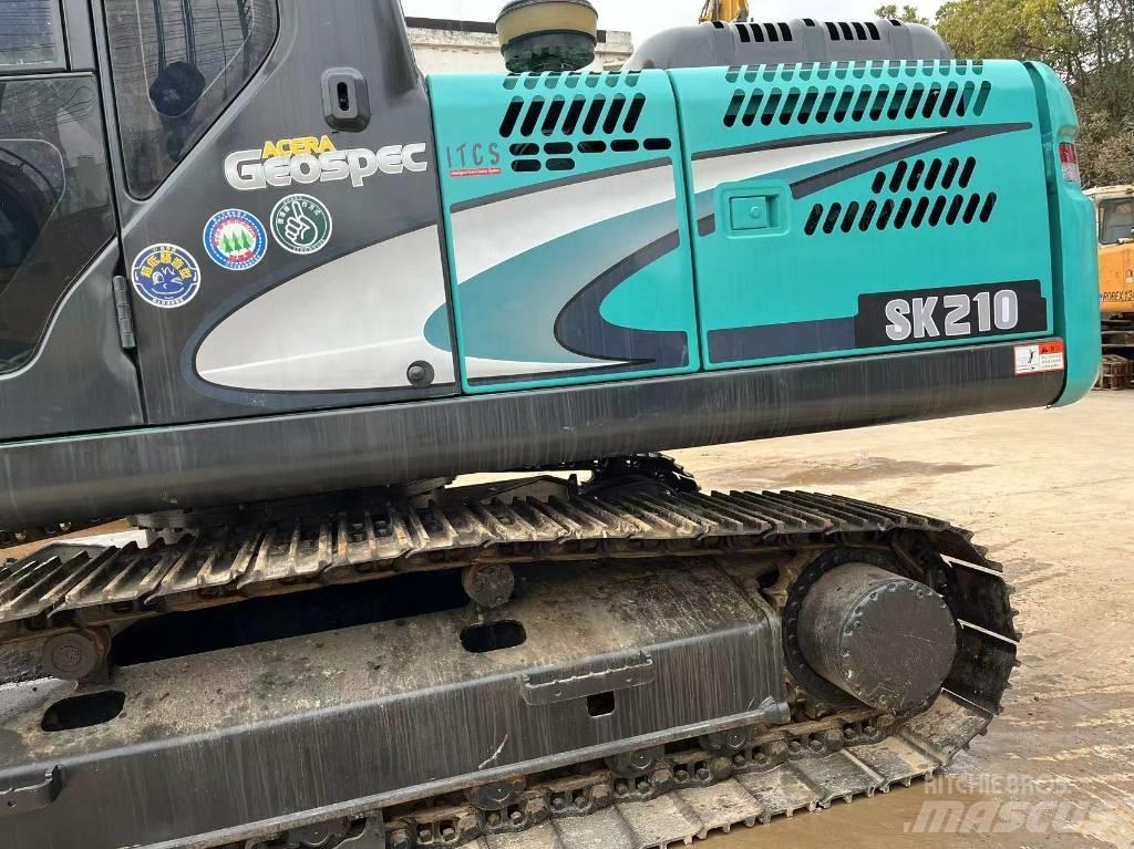 Kobelco SK 210 Pelle sur chenilles