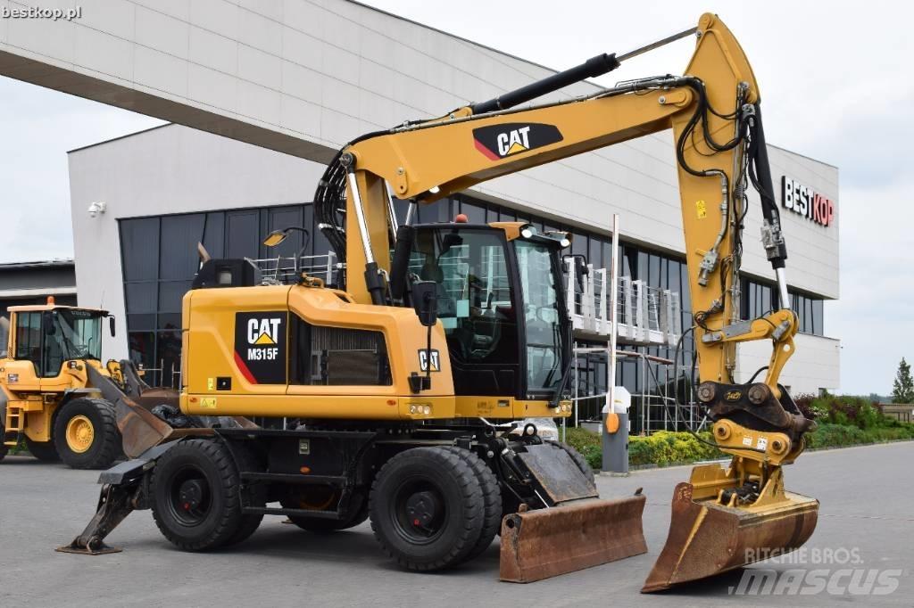 CAT M 315 F Pelle sur pneus