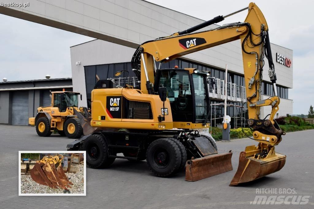 CAT M 315 F Pelle sur pneus