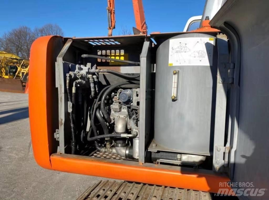 Hitachi EX 100 Pelle sur chenilles