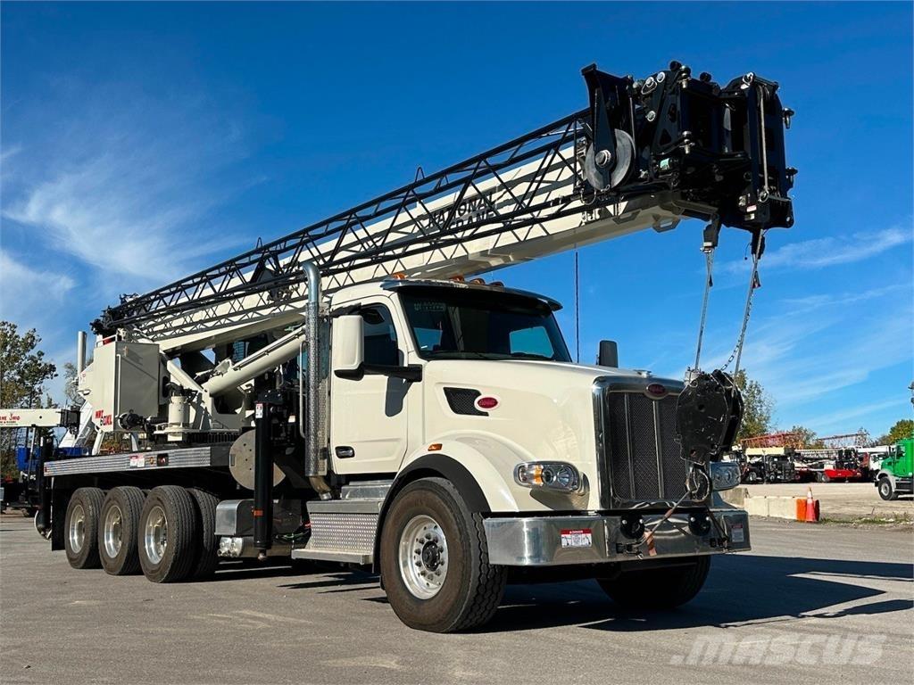 National NBT60 Camion plateau ridelle avec grue