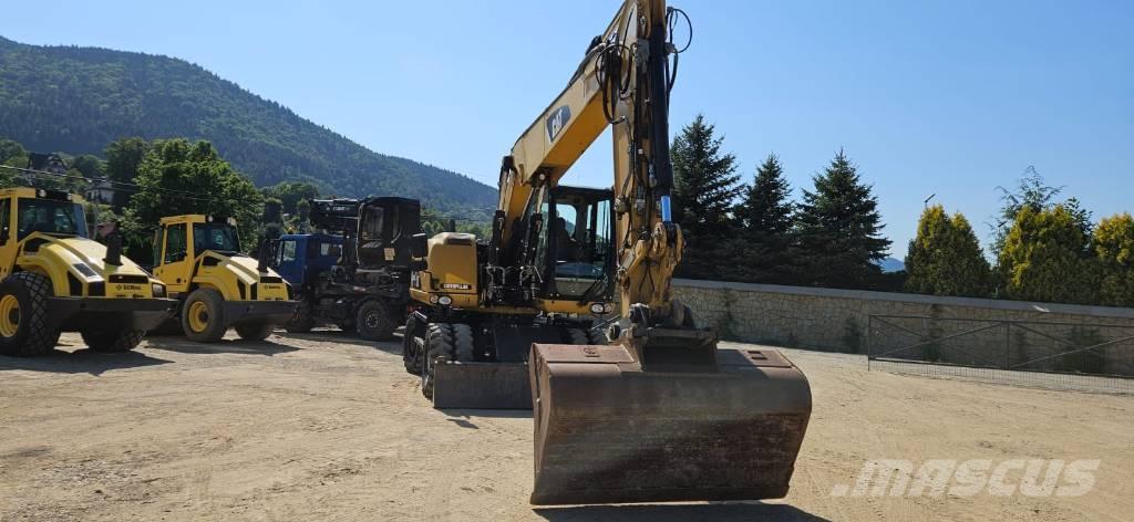 CAT M 315 D Pelle sur pneus