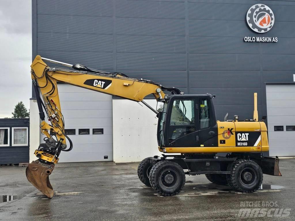 CAT M 316 D Pelle sur pneus