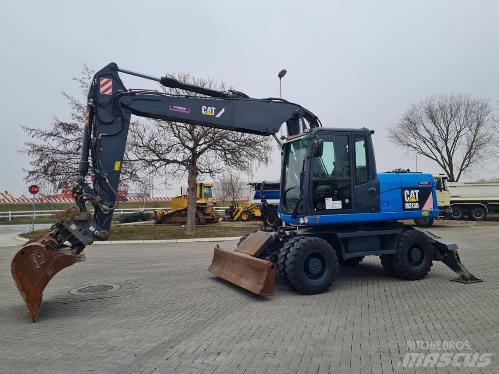 CAT M315D 2 buckets Pelle sur pneus