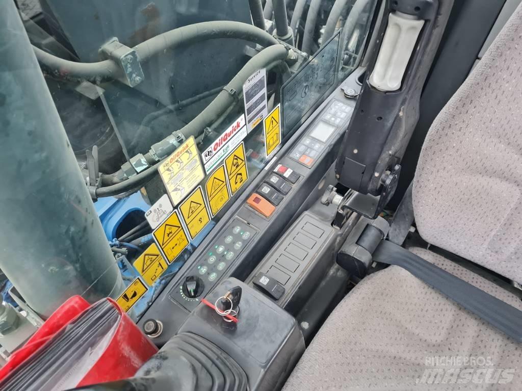 CAT M315D 2 buckets Pelle sur pneus