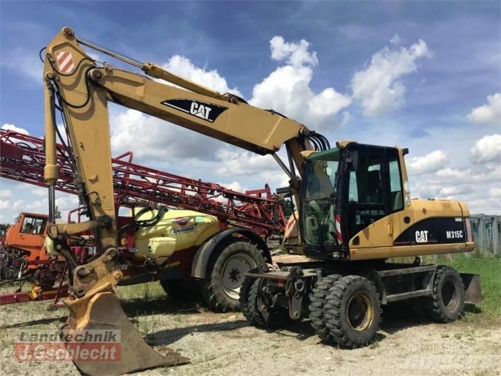 CAT m 315c Pelle sur pneus