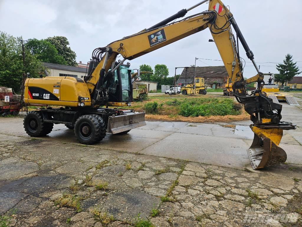 CAT M 316 D Pelle sur pneus