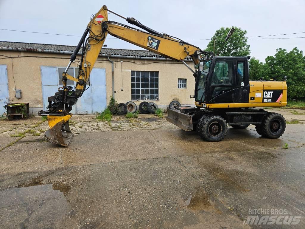 CAT M 316 D Pelle sur pneus