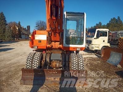 Atlas 1604 Pelle sur pneus