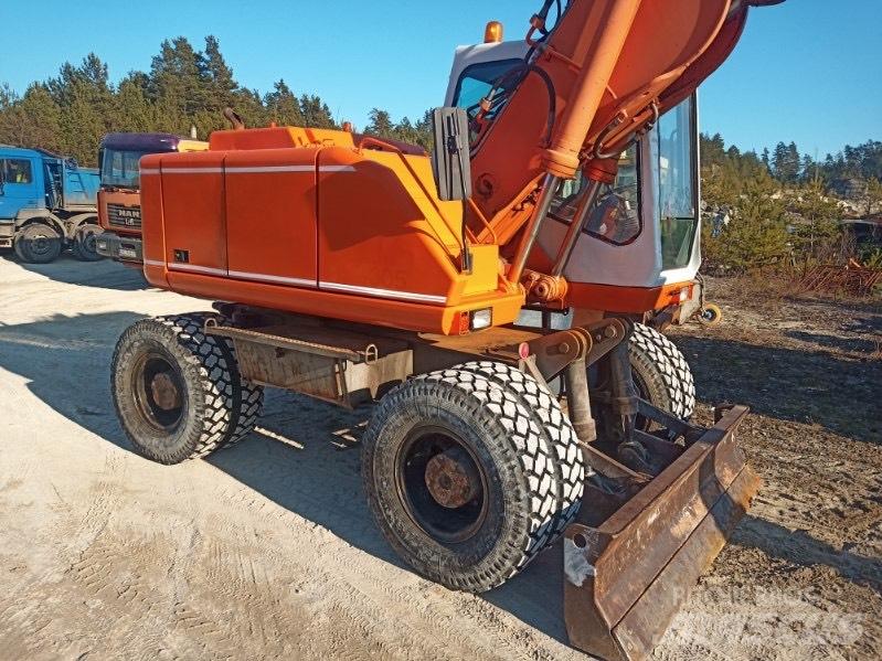 Atlas 1604 Pelle sur pneus