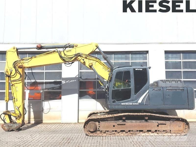 New Holland E 265 C Pelle sur chenilles