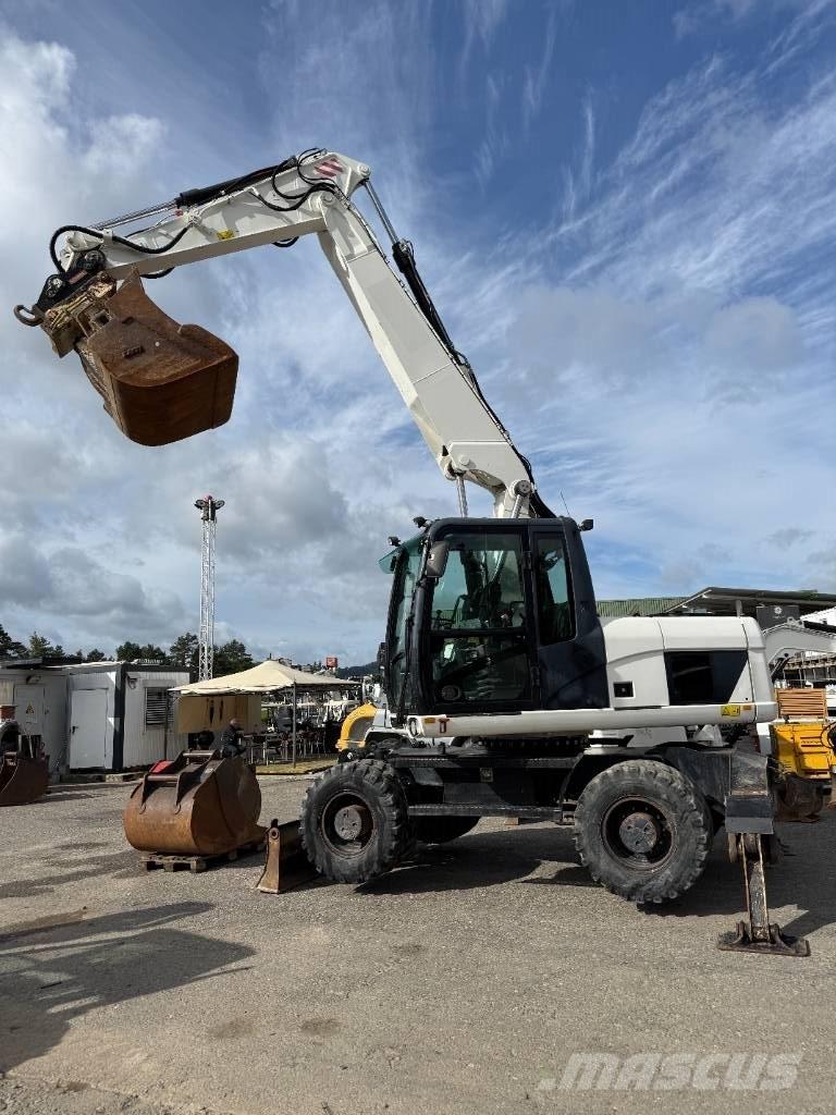 CAT M 316 D Pelle sur pneus