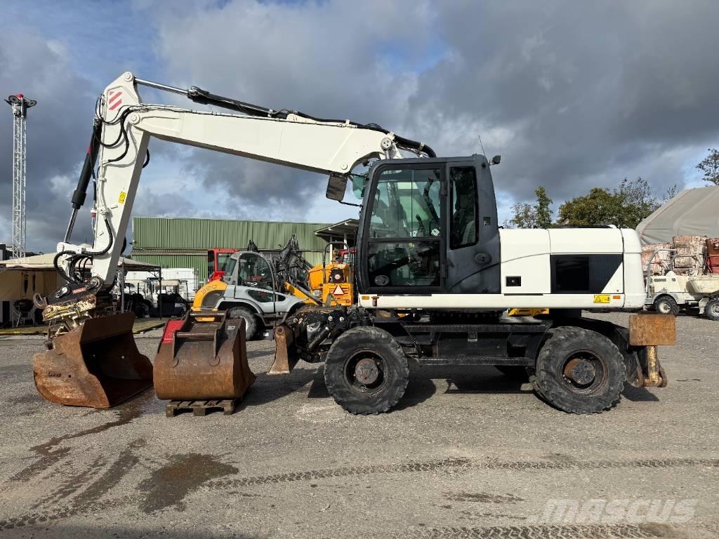 CAT M 316 D Pelle sur pneus
