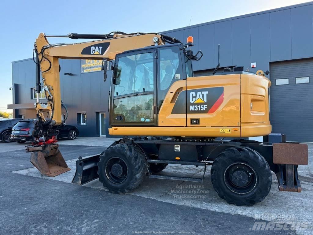 CAT M315F Pelle sur pneus