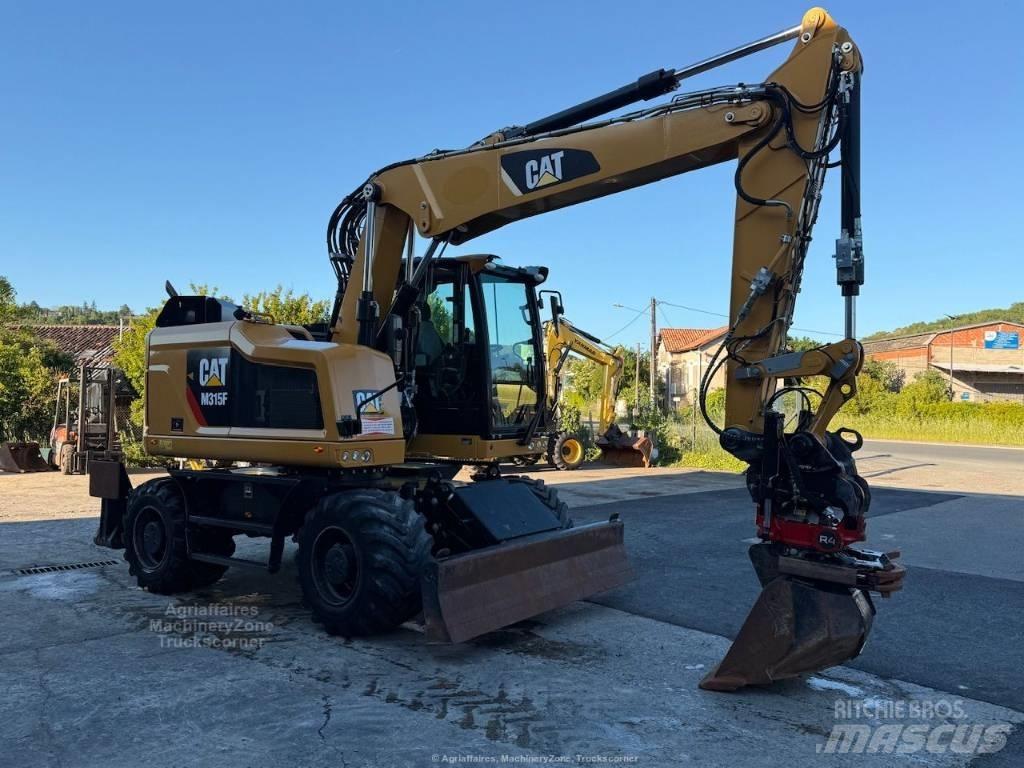 CAT M315F Pelle sur pneus