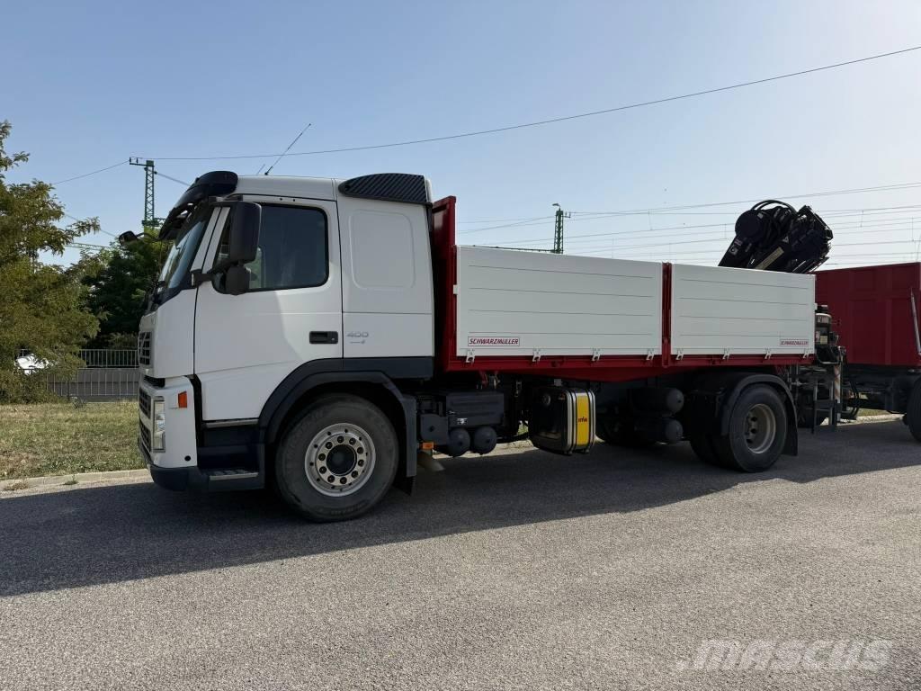 Volvo FM 4X 2R Camion plateau ridelle avec grue