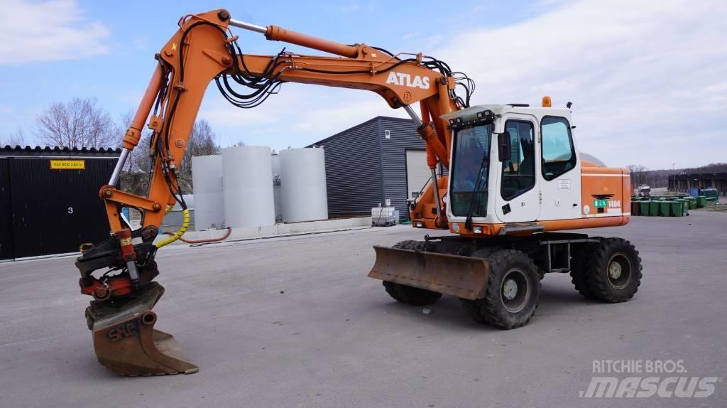 Atlas 1404  Retrade Pelle sur pneus