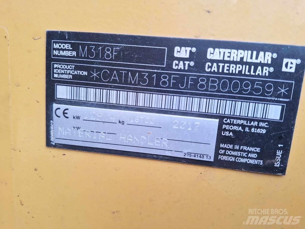 CAT M 318 F Pelle sur pneus