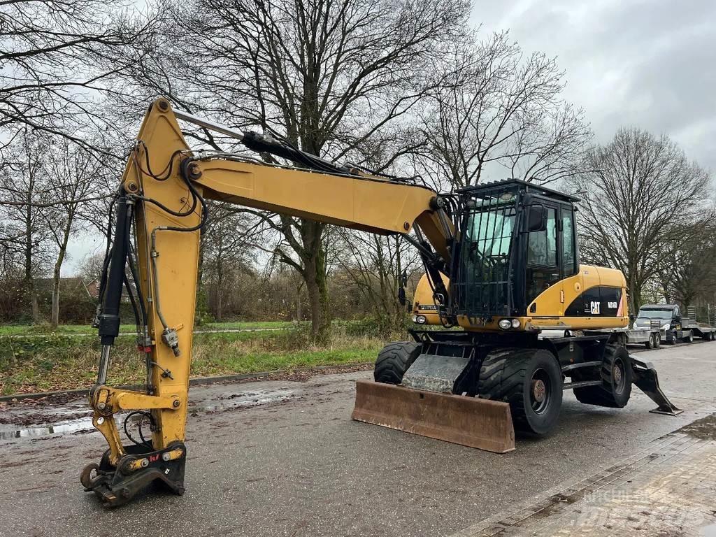 CAT M316D Pelle sur pneus