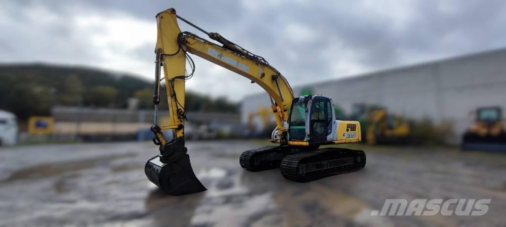 New Holland E 215 LC Pelle sur chenilles