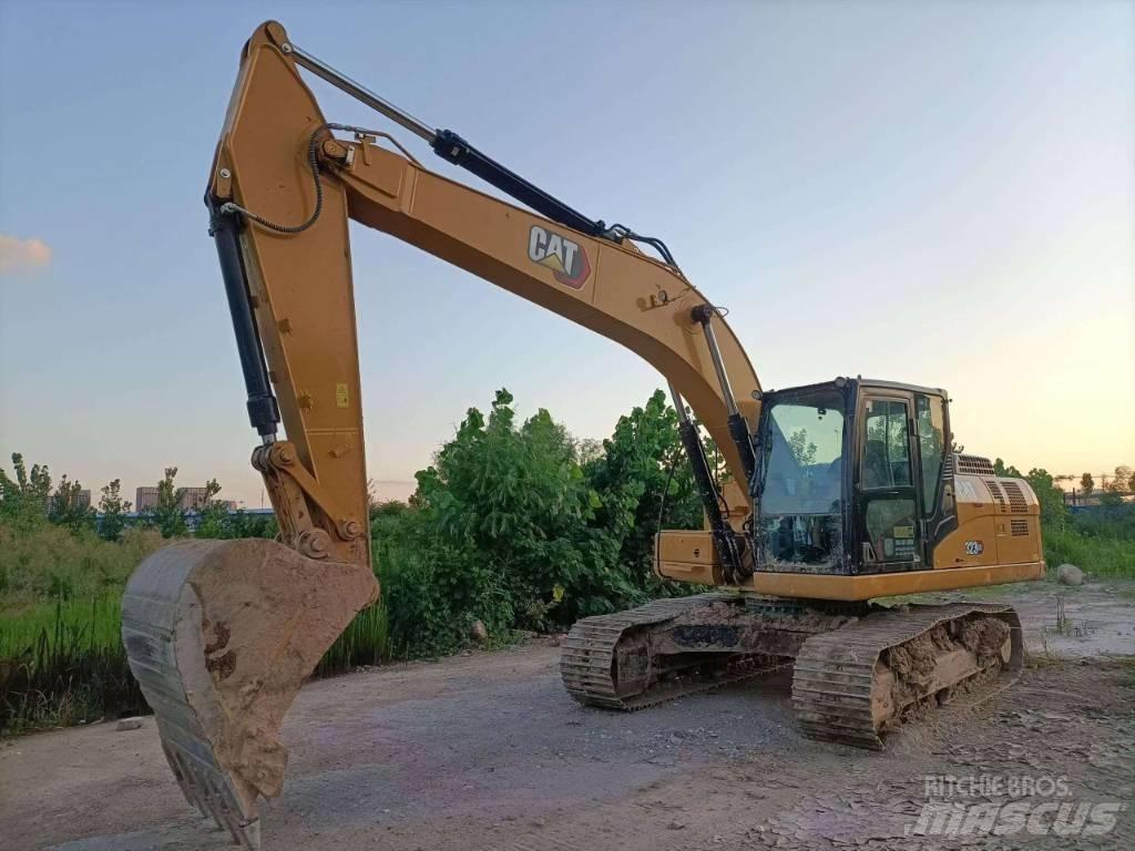 CAT CAT 323GX Pelles amphibies
