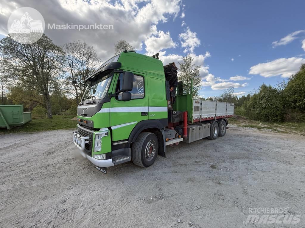 Volvo FM 460 Camion plateau ridelle avec grue