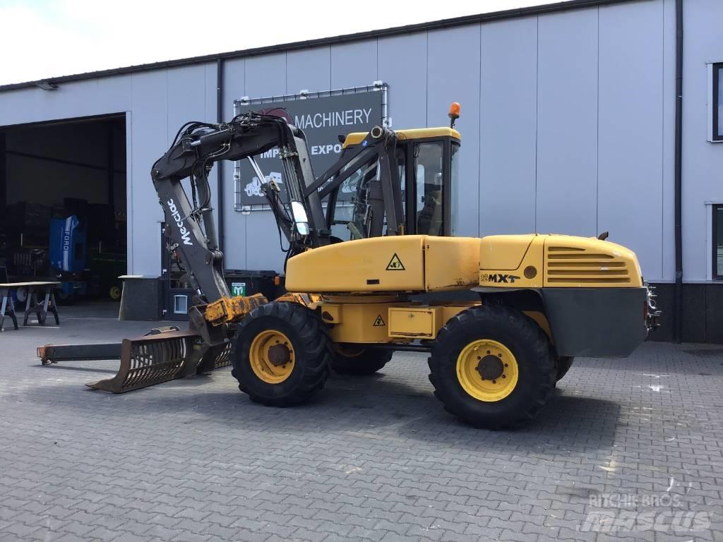 Mecalac 12 MXT Pelle sur pneus