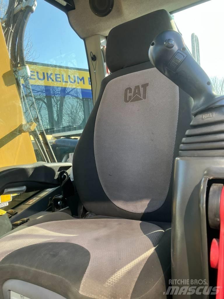 CAT M314F Pelle sur pneus