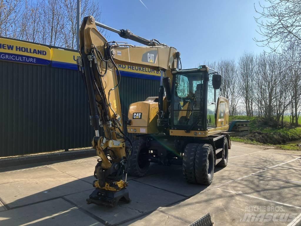 CAT M314F Pelle sur pneus