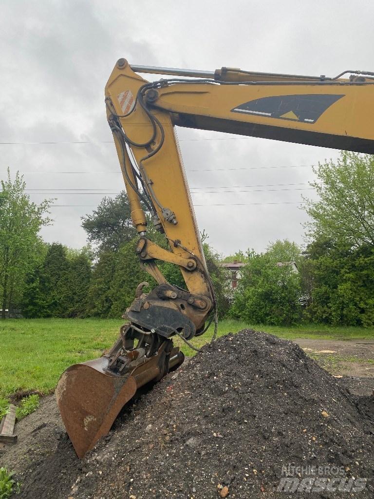 CAT M 316 C Pelle sur pneus