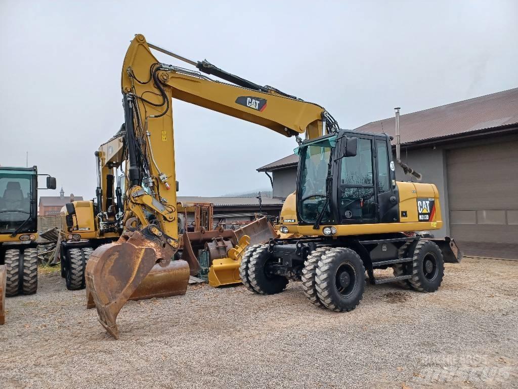 CAT 313 D Pelle sur pneus