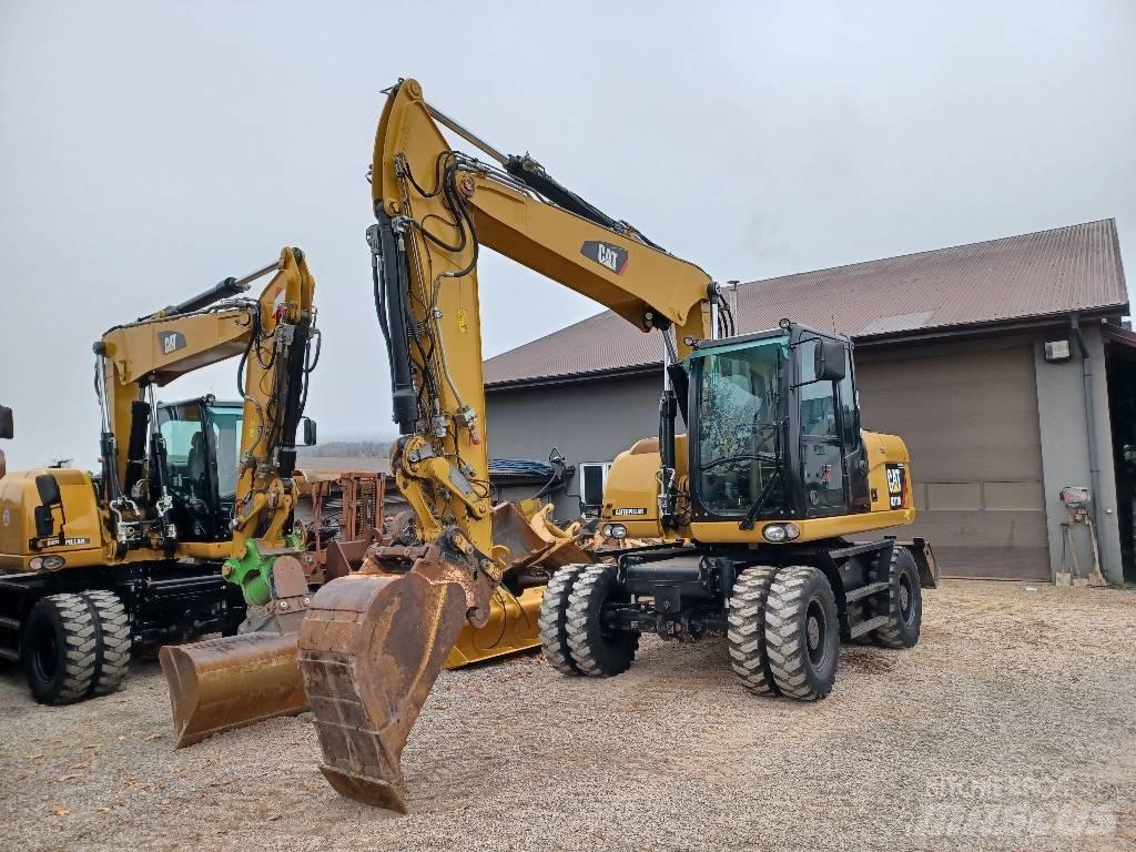 CAT 313 D Pelle sur pneus