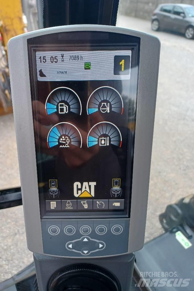 CAT 313 D Pelle sur pneus