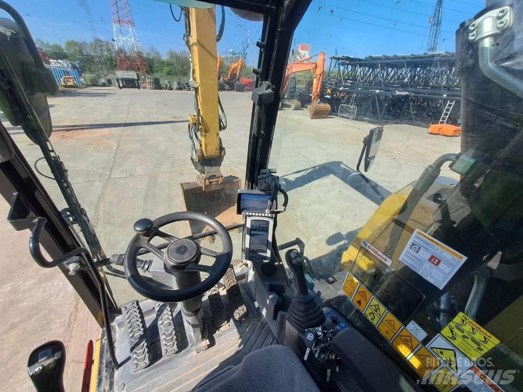 CAT M314F Pelle sur pneus