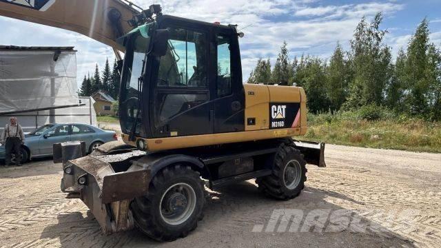 CAT 316 D Pelle sur pneus