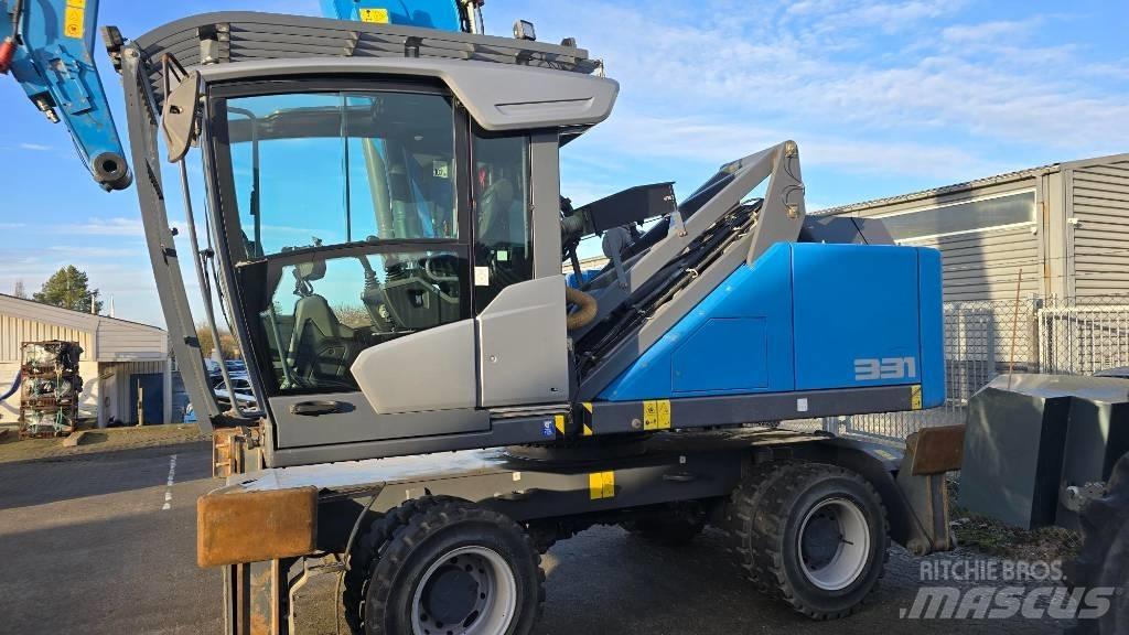 Fuchs 331 F Pelle à déchets