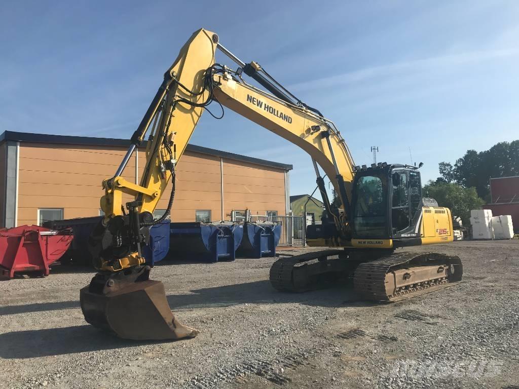 New Holland E 215 C Pelle sur chenilles