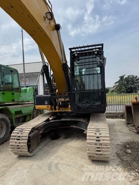 CAT 323 E Pelle sur chenilles