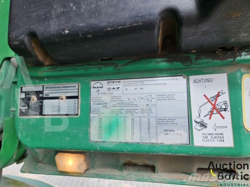 MAN 32.464 Camion benne