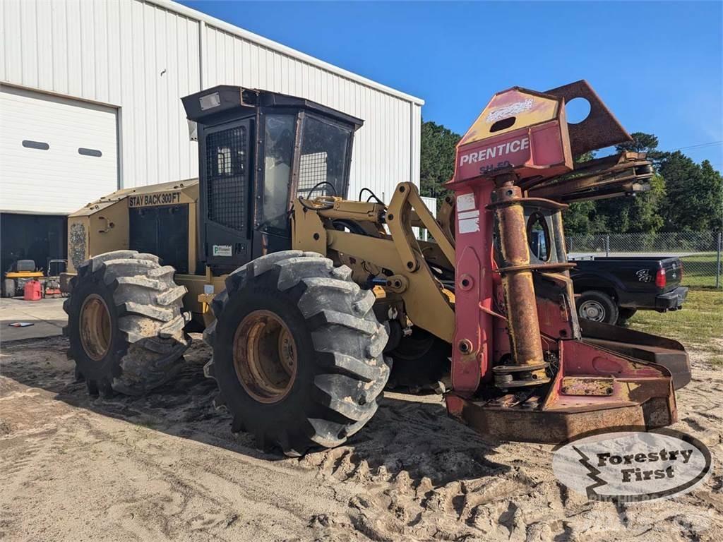 CAT 553 Abatteuse groupeuse