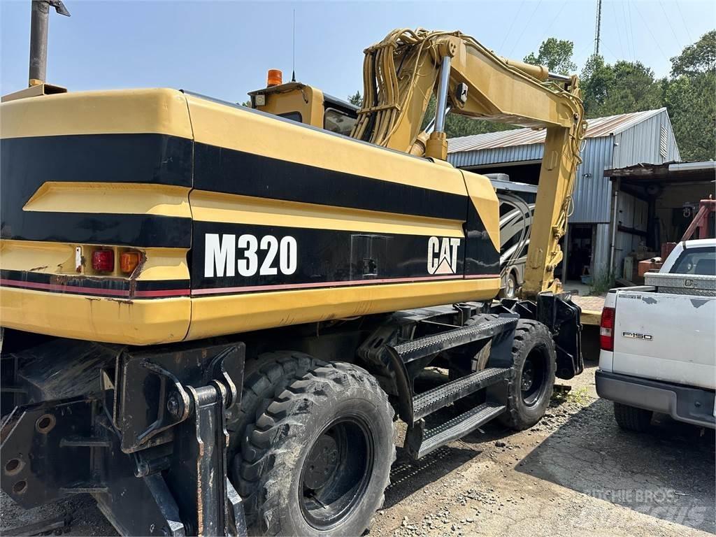 CAT M320 Pelle sur pneus