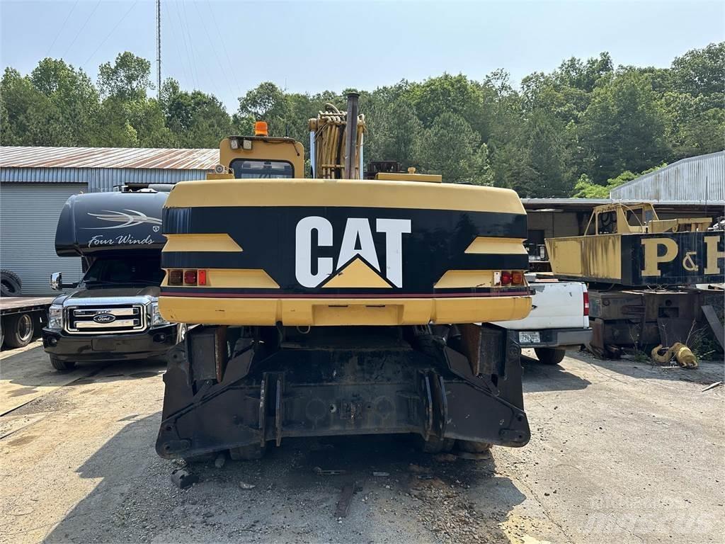 CAT M320 Pelle sur pneus