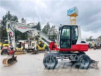 Takeuchi TB295W Pelle sur pneus