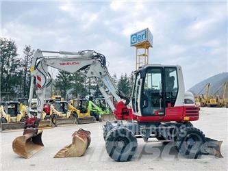 Takeuchi TB295W Pelle sur pneus