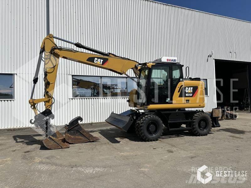 CAT M315F Pelle sur pneus