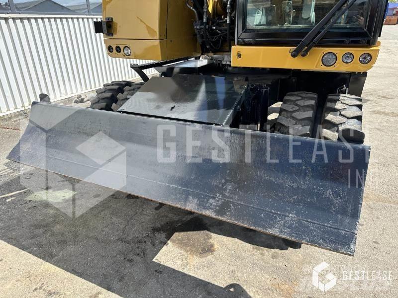 CAT M315F Pelle sur pneus
