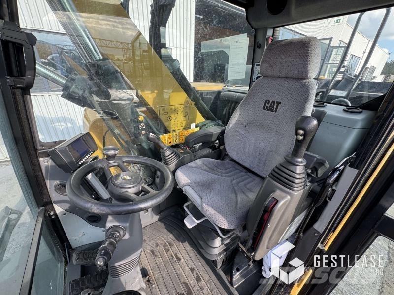CAT M315F Pelle sur pneus