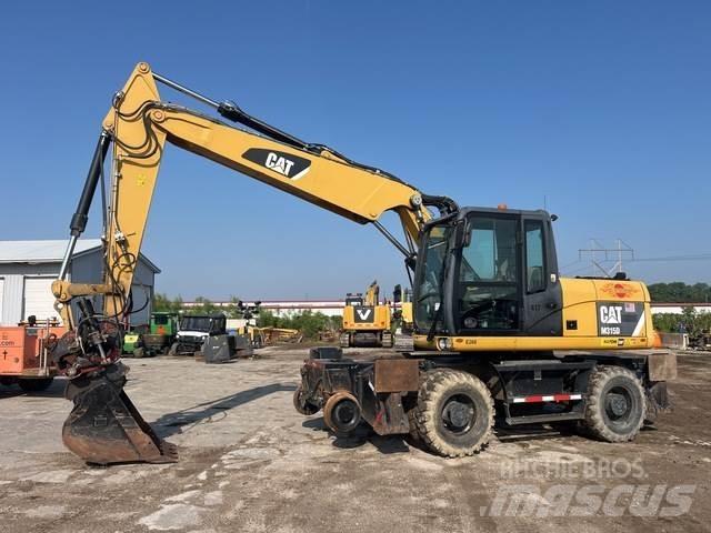 CAT M315D Pelle sur pneus